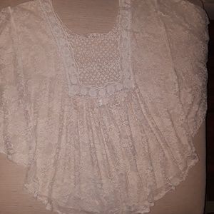 SOLD.       Beautiful lace Cape style blouse